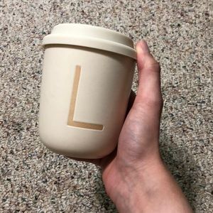 World Market anagrammed ceramic travel mug